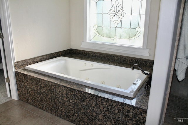 3703 E 3793 N, Kimberly, ID 83341 - bathroom featuring a jetted tub and tile patterned flooring