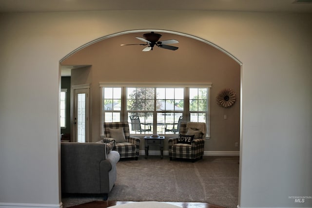 3703 E 3793 N, Kimberly, ID 83341 - living room featuring ceiling fan, arched walkways, and carpet