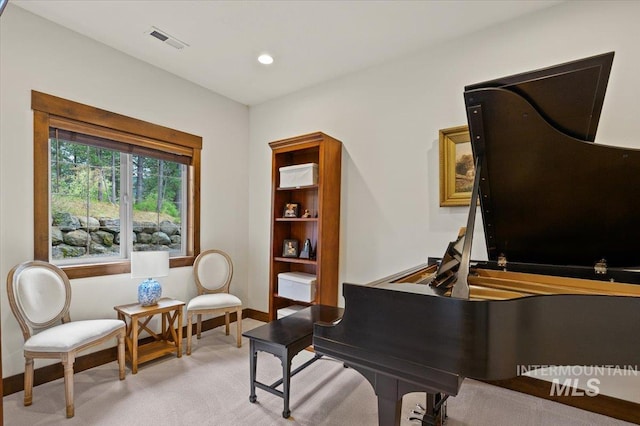 3801 S Carpenter Loop, Post Falls, ID 83854 - sitting room with light colored carpet, baseboards, visible vents, and recessed lighting
