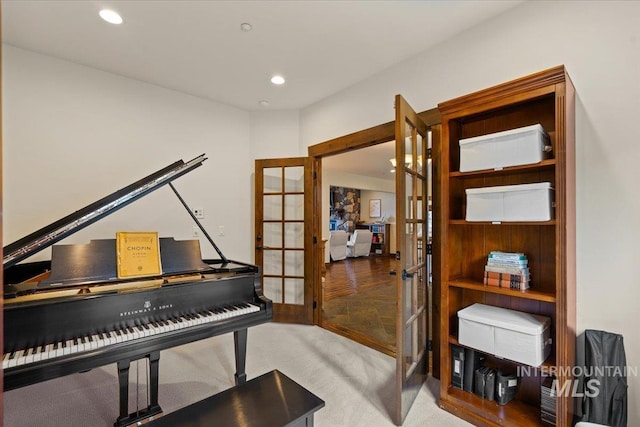 3801 S Carpenter Loop, Post Falls, ID 83854 - living area with carpet floors, french doors, and recessed lighting