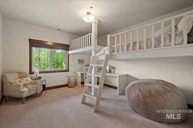 3801 S Carpenter Loop, Post Falls, ID 83854 - carpeted bedroom with baseboards and visible vents