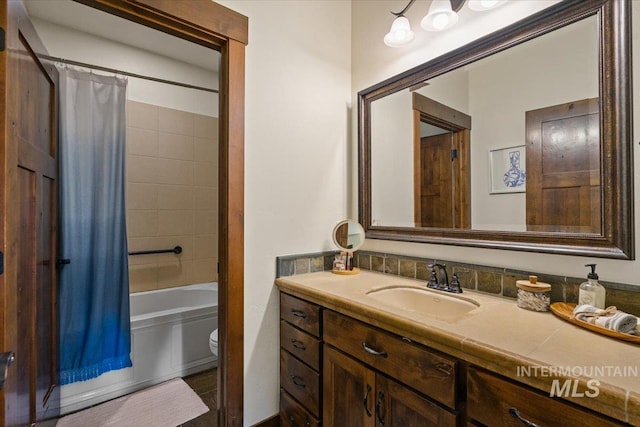 3801 S Carpenter Loop, Post Falls, ID 83854 - bathroom with vanity, shower / bath combo, and toilet