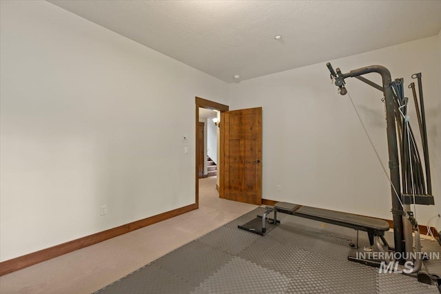 3801 S Carpenter Loop, Post Falls, ID 83854 - workout area featuring carpet floors and baseboards
