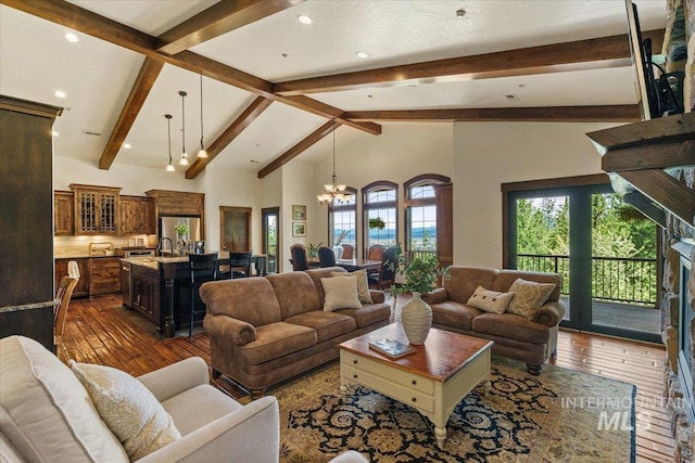 3801 S Carpenter Loop, Post Falls, ID 83854 - living room featuring recessed lighting, a notable chandelier, dark wood finished floors, and beam ceiling
