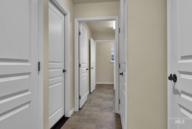 2870 N Cloverdale, Boise, ID 83713 - hall with baseboards and a textured wall