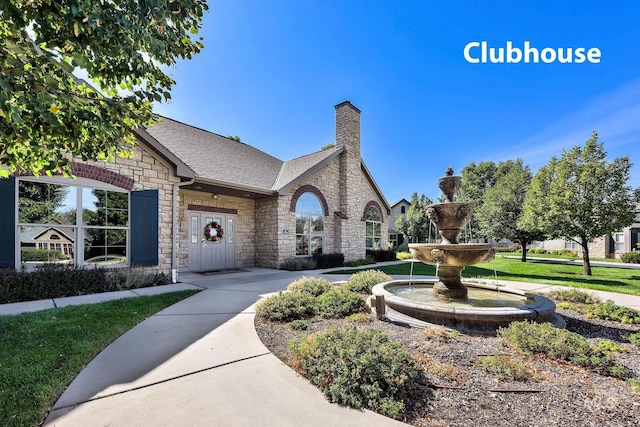 2870 N Cloverdale, Boise, ID 83713 - view of front of house featuring stone siding and a chimney