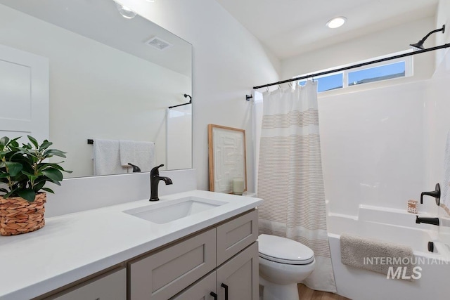 full bath with visible vents, toilet, recessed lighting, shower / bath combination with curtain, and vanity