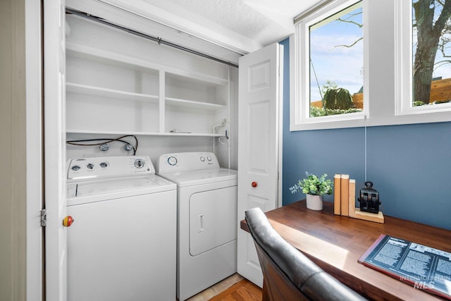 laundry area featuring laundry area and separate washer and dryer