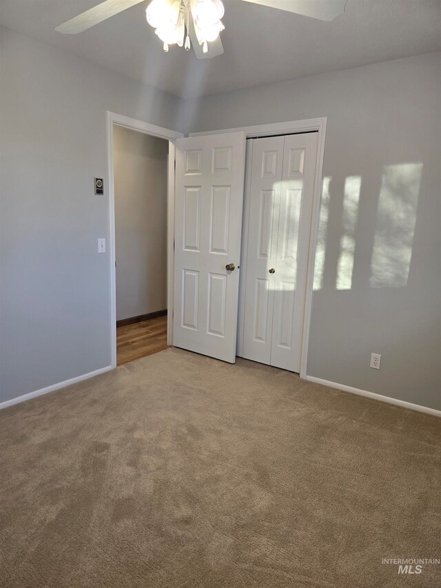 interior space featuring ceiling fan