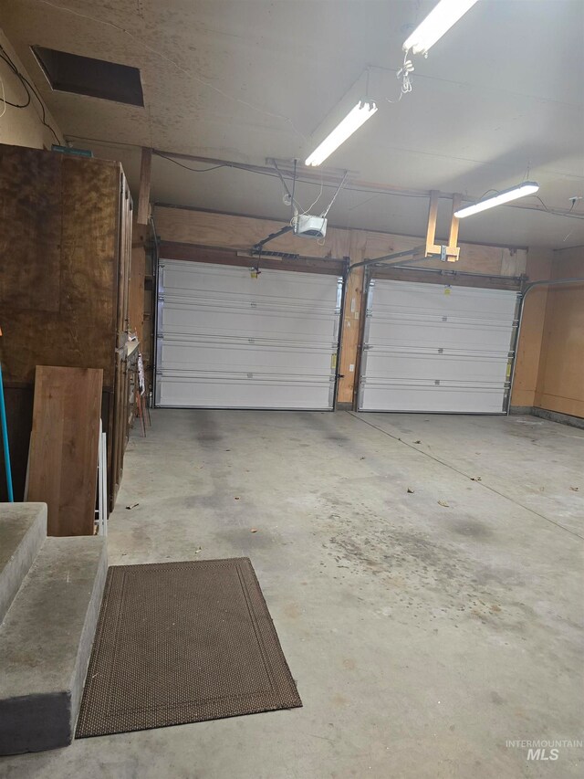 garage featuring a garage door opener