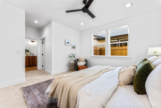 carpeted bedroom featuring ceiling fan