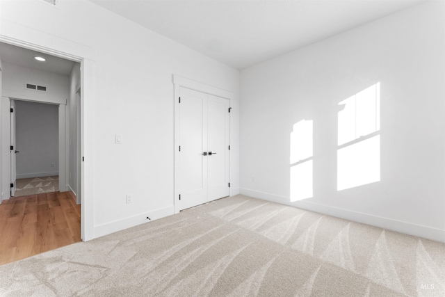 unfurnished bedroom featuring carpet