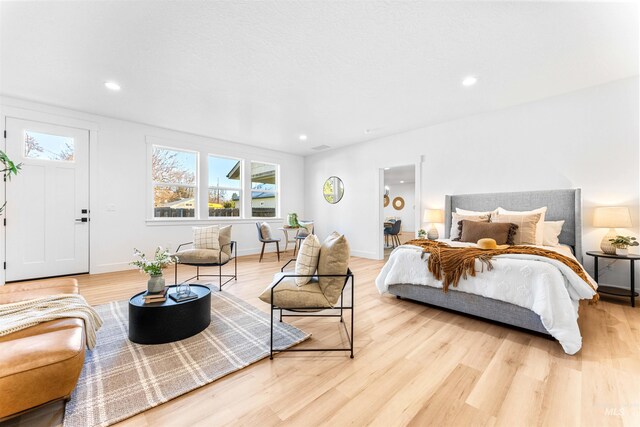 bedroom featuring light hardwood / wood-style floors