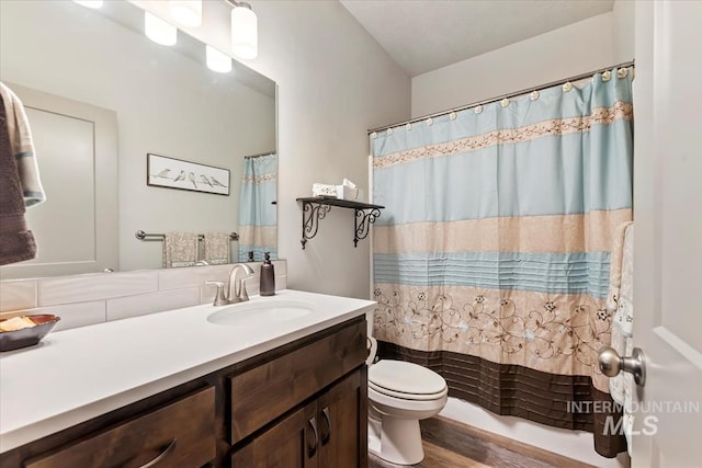 302 Broken Crk, Mccall, ID 83638 - bathroom with wood finished floors, toilet, and vanity