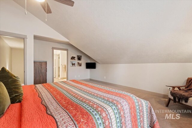 302 Broken Crk, Mccall, ID 83638 - carpeted bedroom with lofted ceiling, baseboards, and a ceiling fan