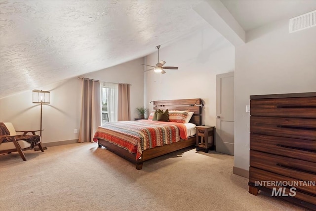 302 Broken Crk, Mccall, ID 83638 - bedroom featuring vaulted ceiling, carpet flooring, a textured ceiling, baseboards, and ceiling fan