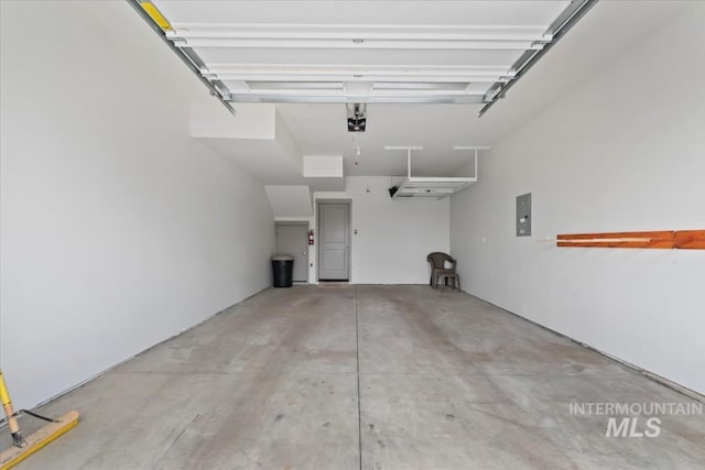 302 Broken Crk, Mccall, ID 83638 - garage with a garage door opener and electric panel