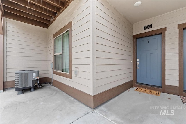 302 Broken Crk, Mccall, ID 83638 - property entrance featuring central AC and a patio