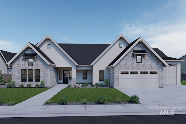 view of front of house featuring a front lawn, driveway, stone siding, and stucco siding