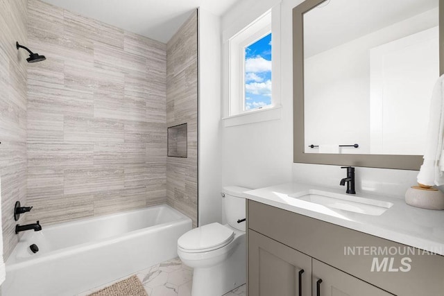 11179 N Elk Ridge Way, Boise, ID 83714 - full bathroom with toilet, vanity,  shower combination, and marble finish floors