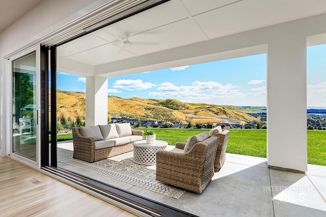 5935 E Marmount Ct, Boise, ID 83716 - view of patio featuring an outdoor hangout area, ceiling fan, and a mountain view