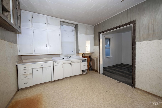 kitchen with sink and white cabinets