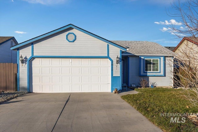 single story home with a garage