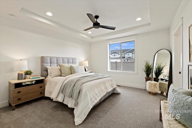 2316 E Valensole St, Meridian, ID 83642 - bedroom with a tray ceiling, dark colored carpet, baseboards, recessed lighting, and ceiling fan