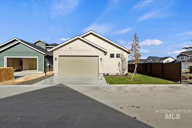 2316 E Valensole St, Meridian, ID 83642 - ranch-style house with board and batten siding, a garage, and driveway