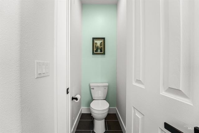 3832 W Aspen Creek Ct, Meridian, ID 83642 - bathroom featuring toilet, tile patterned floors, and baseboards
