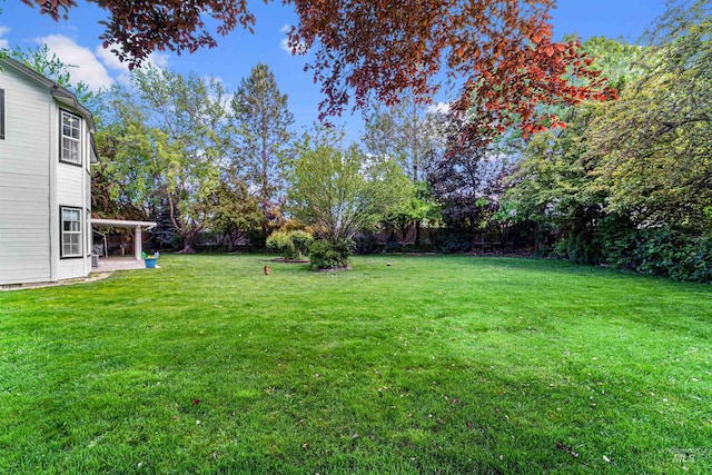 3832 W Aspen Creek Ct, Meridian, ID 83642 - view of grassy yard featuring a patio area