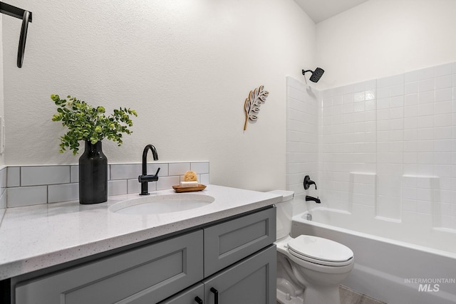 6825 W Ustick, Boise, ID 83704 - full bathroom featuring vanity, washtub / shower combination, and toilet