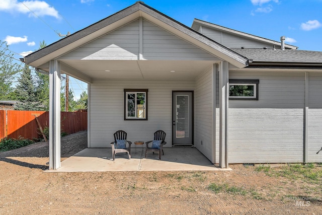 6825 W Ustick, Boise, ID 83704 - rear view of property featuring fence, a patio, and crawl space
