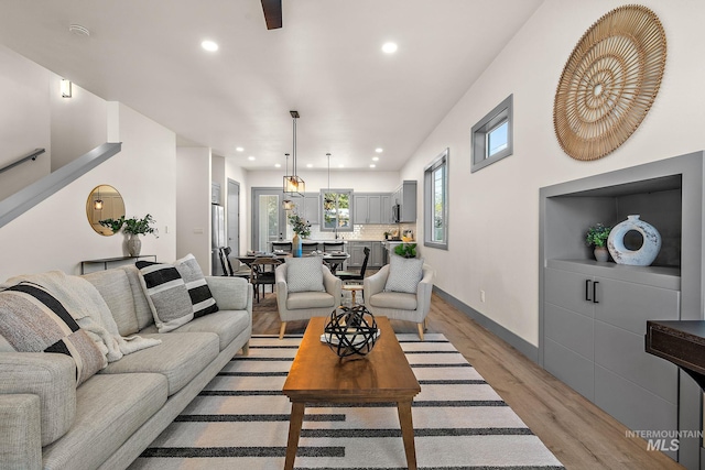 6825 W Ustick, Boise, ID 83704 - living area with baseboards, light wood finished floors, and recessed lighting