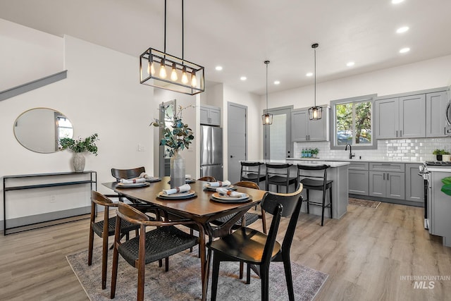 6825 W Ustick, Boise, ID 83704 - dining room featuring recessed lighting and light wood-type flooring