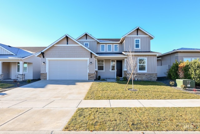 craftsman-style house with a front lawn and a garage