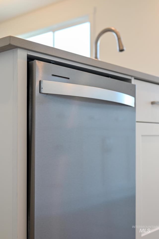 details featuring stainless steel dishwasher