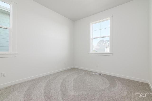 view of carpeted spare room