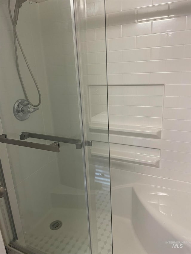 bathroom with walk in shower