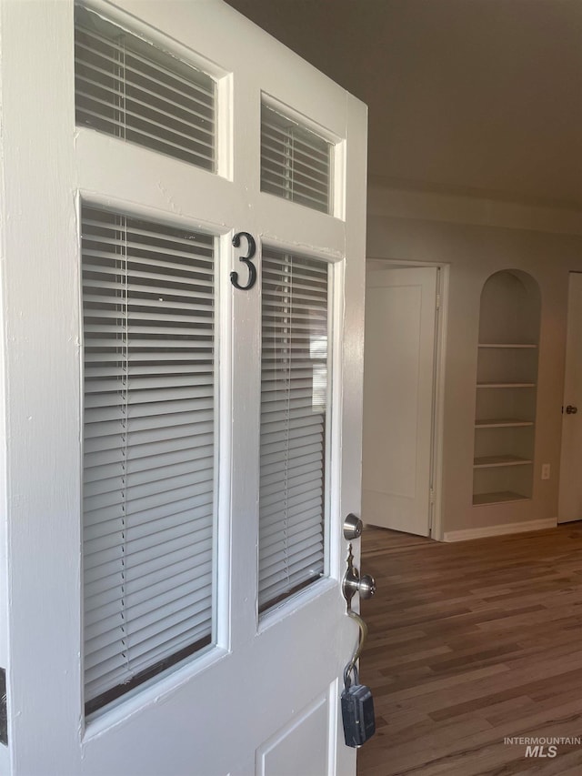 interior details featuring hardwood / wood-style floors