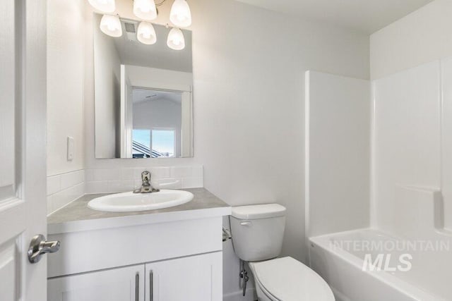 1116 N Peakhurt Ave, Kuna, ID 83634 - bathroom with vanity, washtub / shower combination, and backsplash