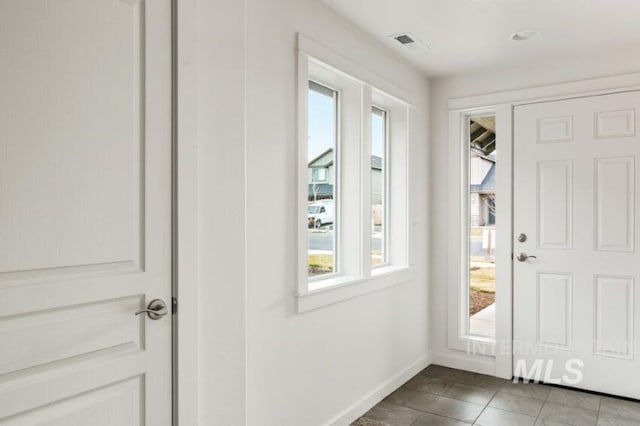 1116 N Peakhurt Ave, Kuna, ID 83634 - foyer featuring baseboards and tile patterned floors