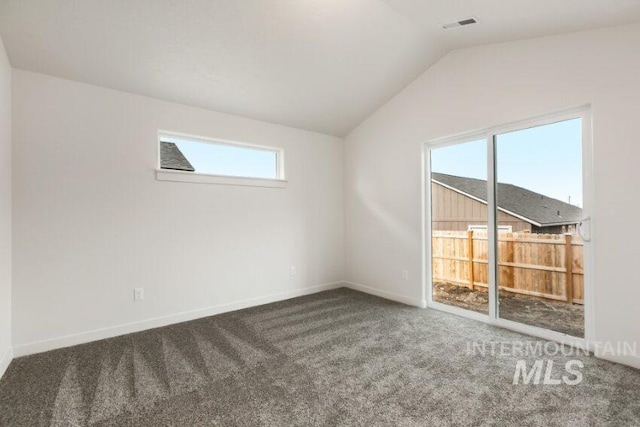 1116 N Peakhurt Ave, Kuna, ID 83634 - carpeted empty room featuring lofted ceiling and baseboards