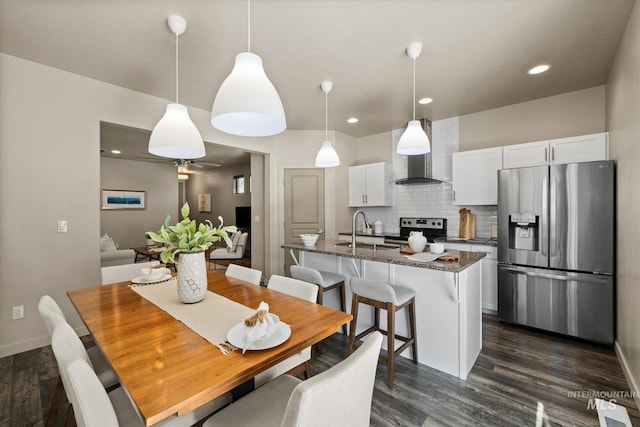 2089 W Claira Rd, Nampa, ID 83651 - dining area featuring dark wood-style flooring, a ceiling fan, and recessed lighting