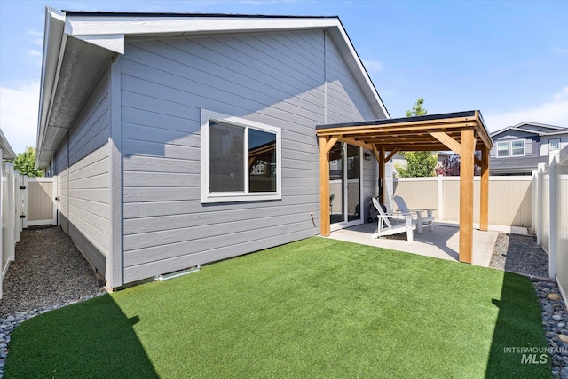 2089 W Claira Rd, Nampa, ID 83651 - back of house featuring a patio area and a fenced backyard