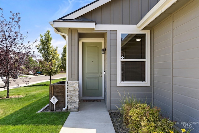 2089 W Claira Rd, Nampa, ID 83651 - property entrance featuring board and batten siding and a lawn