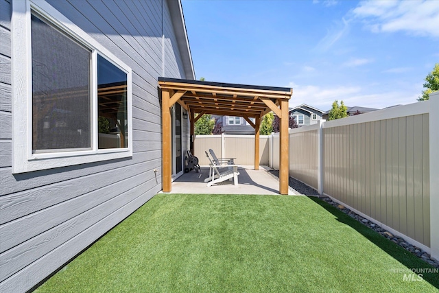2089 W Claira Rd, Nampa, ID 83651 - fenced backyard featuring a patio area