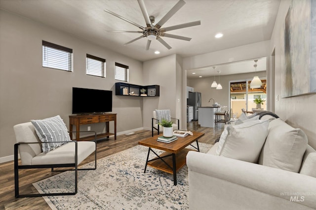 2089 W Claira Rd, Nampa, ID 83651 - living room with ceiling fan, wood finished floors, and recessed lighting