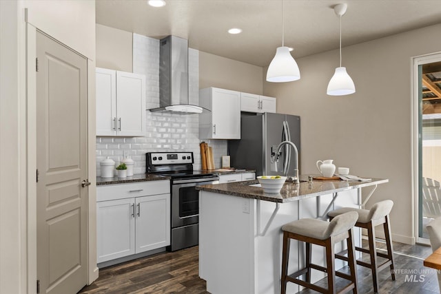 2089 W Claira Rd, Nampa, ID 83651 - kitchen with wall chimney exhaust hood, appliances with stainless steel finishes, dark wood-style flooring, backsplash, and recessed lighting