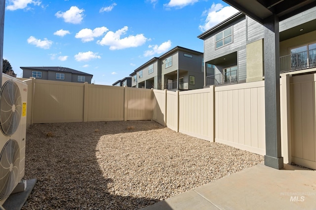 7439 W Swain Ln, Garden City, ID 83714 - view of yard with a fenced backyard and a residential view